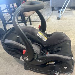 Porta bebé  con adaptador de carro
