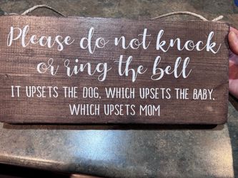 Wood sign. Please do not knock