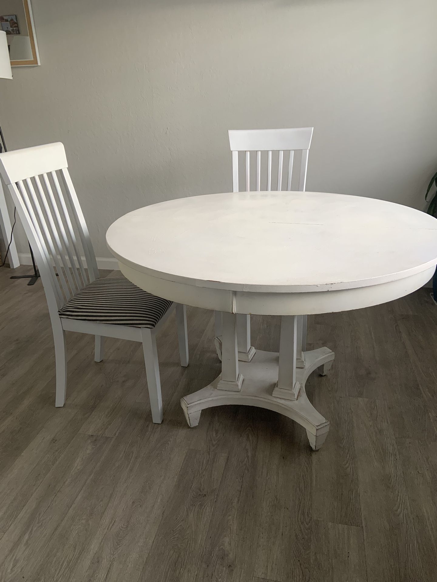 Round White Table And Two Chairs