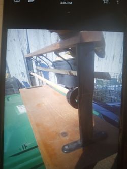 paper roll holder, for a shop?. Holds paper rolls and other rolls