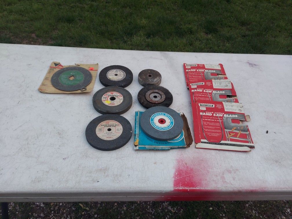 Bench grinder wheels. And 3 ban Saw Blades Everything you see 5 Dollars.