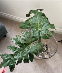 Faux leaves with vase