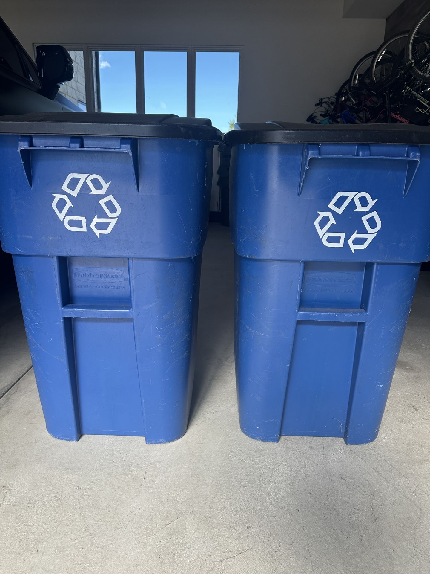 2 Used Rubbermaid Recycle Bins