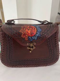 Sun and moon leather purse