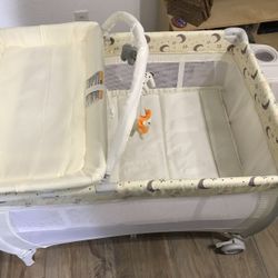 Playpen/Bassinet With Changing Table and Storage