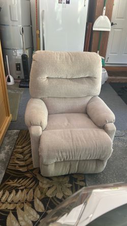 Recliner with adjustable head rest - electric with phone charger cream color