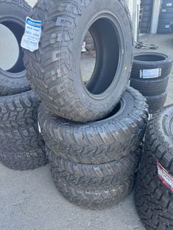 35X12.50R18 SET OF 4 MUD TIRES WITH INSTALLATION AND BALANCING 