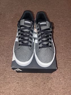 Size 8, men’s brand new unworn Adidas shoes with tags and box