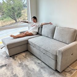 GREY PULLOUT COUCH