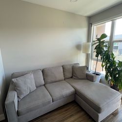 Living Spaces Sectional Sofa with Movable Ottoman