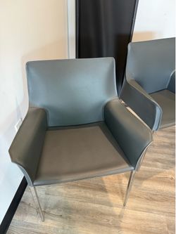 Sturdy office or home chairs in great condition. Features durable grey fabric material with strong metal feet for extra stability and a modern look. C
