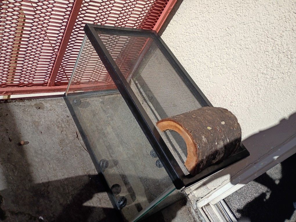 Reptile Tank And Heating Rock, 2 Heating Lamps, Feeding Bowls, Balls For Slow Feed, And Climbing Wood One Is A 40 Gallon, One Is 10 Gallon