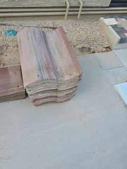 Free S shape roof tiles. D.R. Horton built.