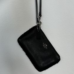 Black Leather Coach Wristlet with silver hardware and fur trim