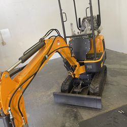 Mini Excavator-Kubota diesel Engine-Comes With All Attachments Bucket,Auger,and pavement Breaker!!!1.2 Hours On Engine