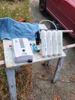 Tankless Water Heater And 4-Stage RO Water Cooler Filter Kit