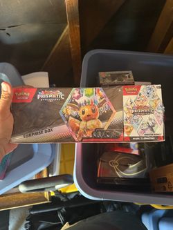 Pokémon Scarlet & Violet Prismatic Evolutions Surprise Box + Booster Bundle