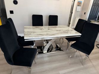 White marble 7 piece dining set table with black and silver soft velvet tufted chairs