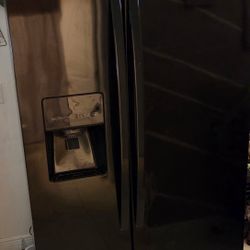 Black Fridge With Freezer. Used But Great Condition