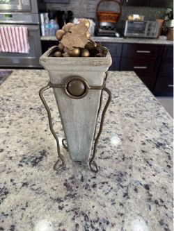 Decorative planter with golden grapes and metal stand