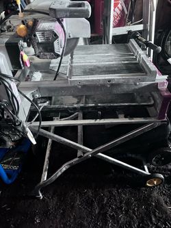 Heavy-duty tile cutter by Chicago Electric (mounted on a rolling folding)