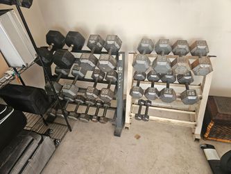 900+ lbs. dumbbells with stands