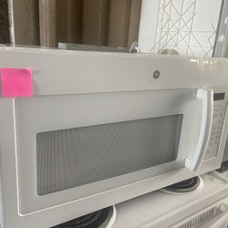 White GE Microwave Over The Stove