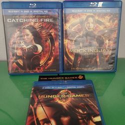 The Hunger Games Catching Fire & Mockingjay Part 1 LOT (Blu-ray, 2012)