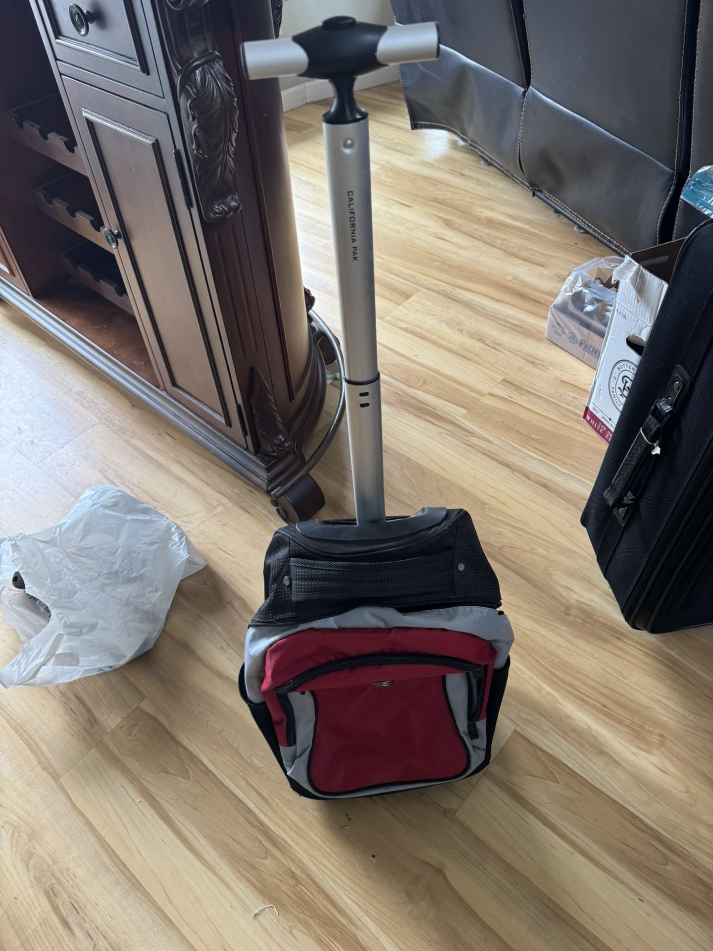 California Pak Rolling Backpack Carry On Size