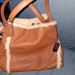 3 purses, 1 coach 1DK. N. Y.\n And one\n Miscellaneous.