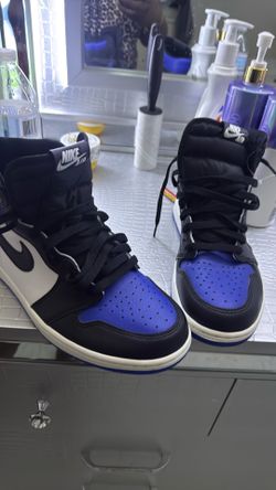 White and royal blue high top air Jordan