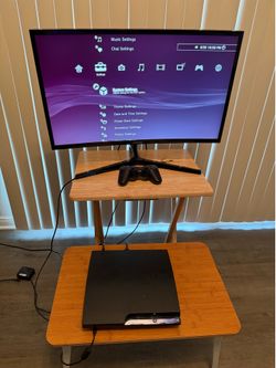 PS3 Slim + Games