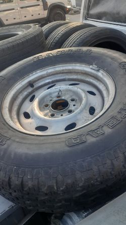 5 lug Ford wheel and tire good.