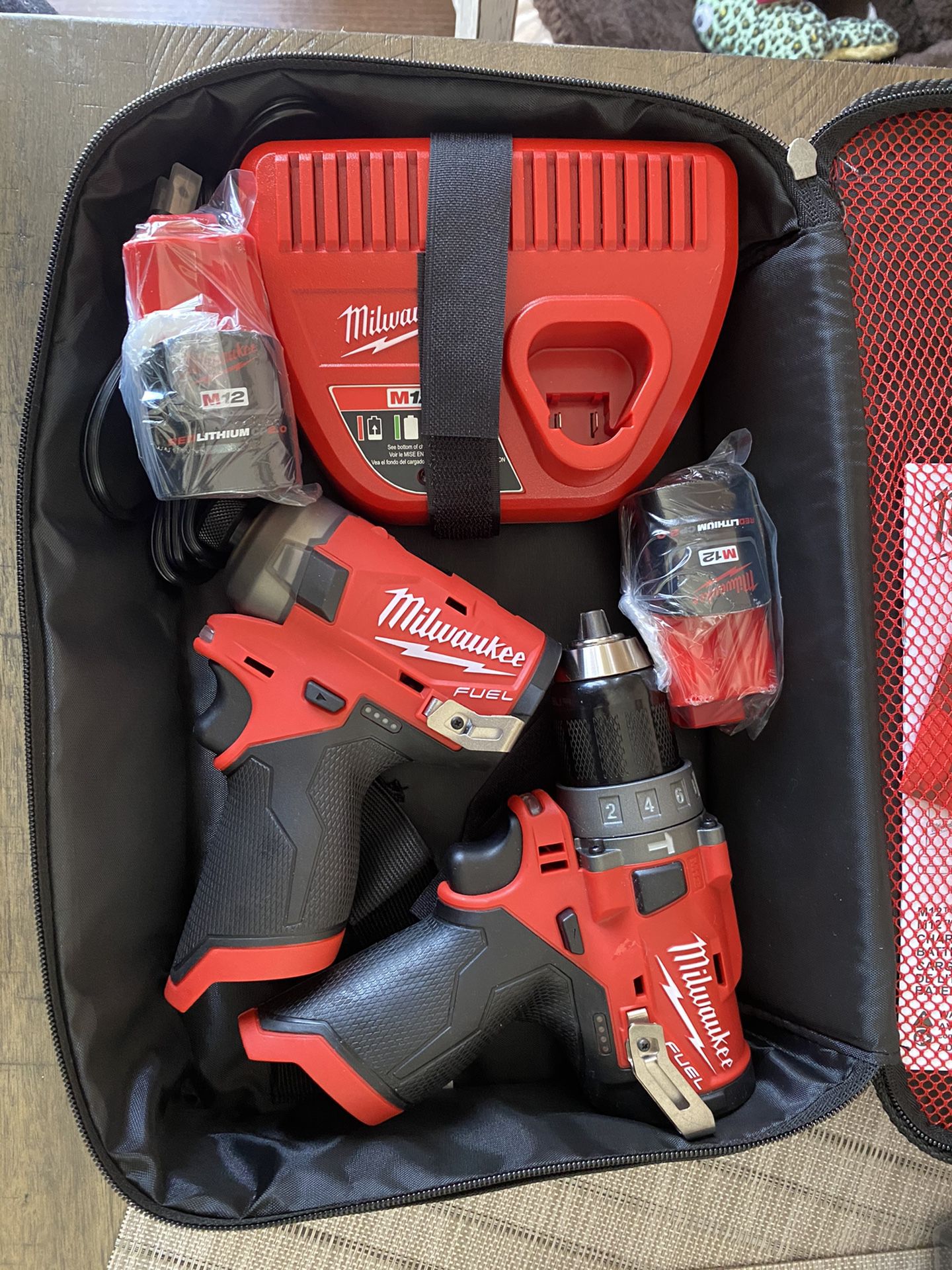 Milwaukee M12 Surge impact & Hammer Drill with two 2.0 batteries and charger