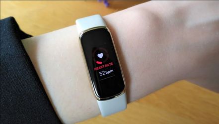 Fitbit luxe with charger , sleep and heart rate tracker and call text and app notifications.