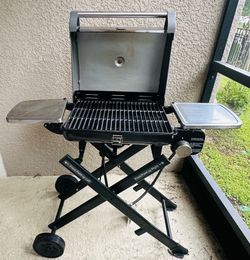 * Moving out sale*  Cuisinart roll-away Portable outdoor grill