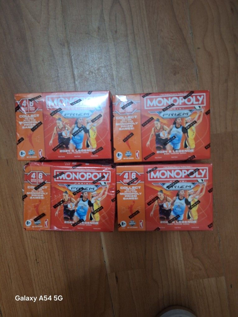 Womens Monopoly Panini Prizm Boxes.