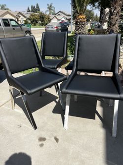 Brand New! (Set of 4) Contemporary Leatherette Dining chairs. $399