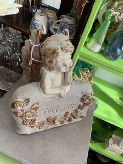 Indoor or outdoor cherub (welcome)