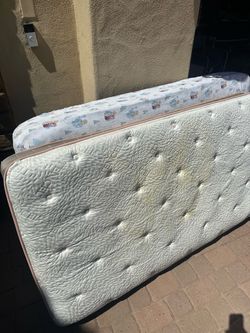 Two twin mattresses and bean bag