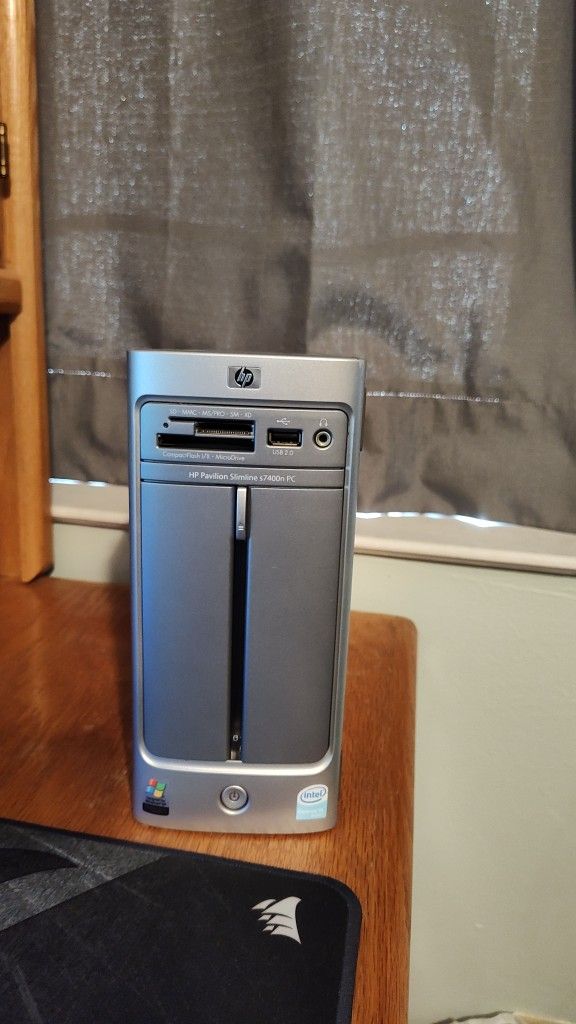 HP Pavilion Slimline s7400n PC running Windows XP