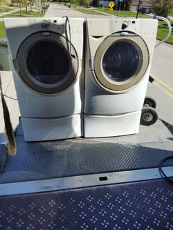 Washer and dryer on pedestal gas