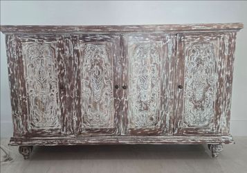 Nadeau decorative wood sideboard .