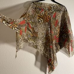 Stunning raw edges poncho style over top