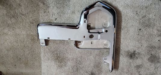 65 Cadillac left upper bumper end