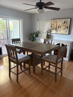 Bar height dining table 60” L x 42” W