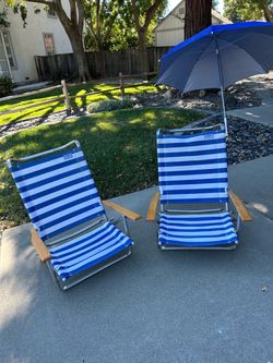PAIR beach chairs with detachable sunshades