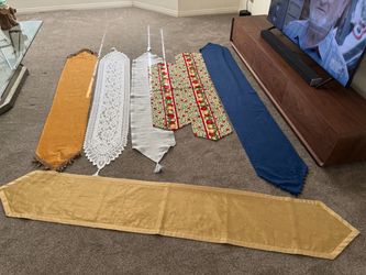 7 Table runners 4ft - 7ft, all have been dry cleaned Mint