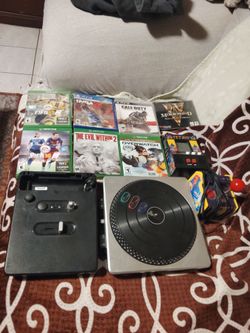 Xbox One games and PlayStation 2 game and PlayStation 3 game 2 mini Arcade games and a DJ hero mixer for the Xbox One or the Will and a  another game