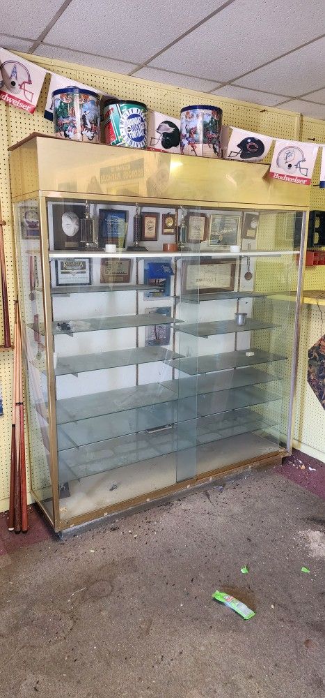 Free, Glass cabinet with shelves.